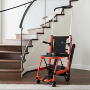 Stairlift attached to a set of wooden stairs in a home setting.